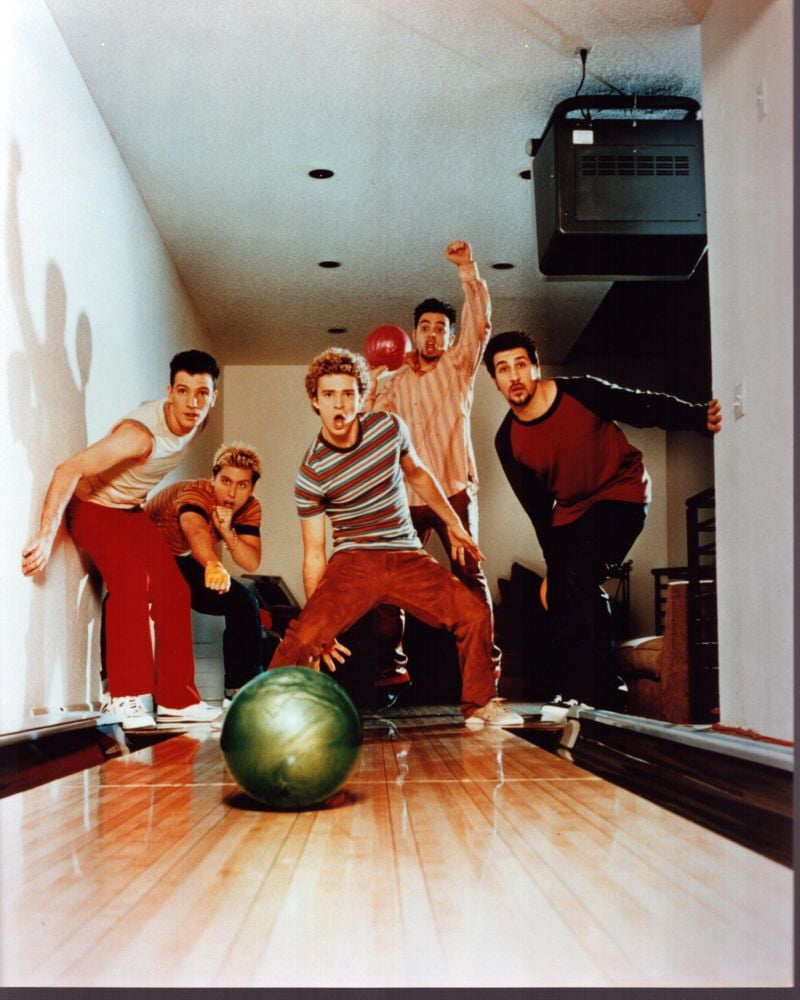 Nsync Group Bowling Photo Print featuring the iconic boy band in a fun bowling scene.