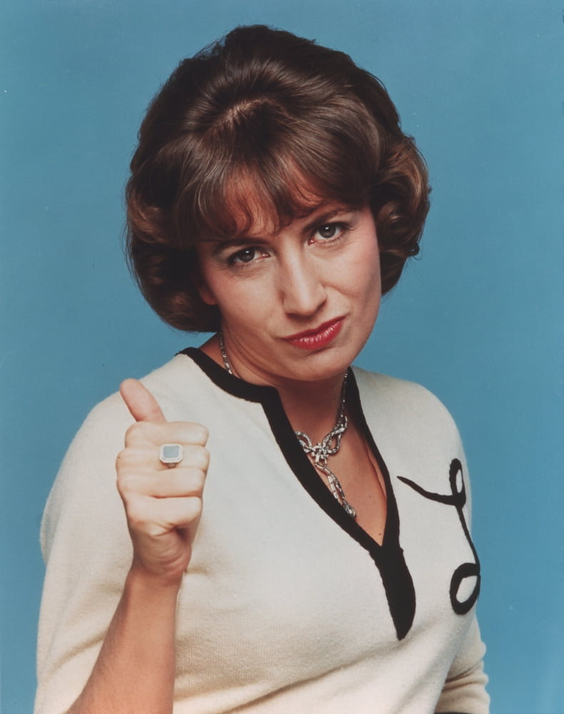 Penny Marshall posed in white portrait photo print.