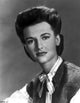 Black and white close-up portrait photo print of Peggy Stewart, showcasing her serious expression.