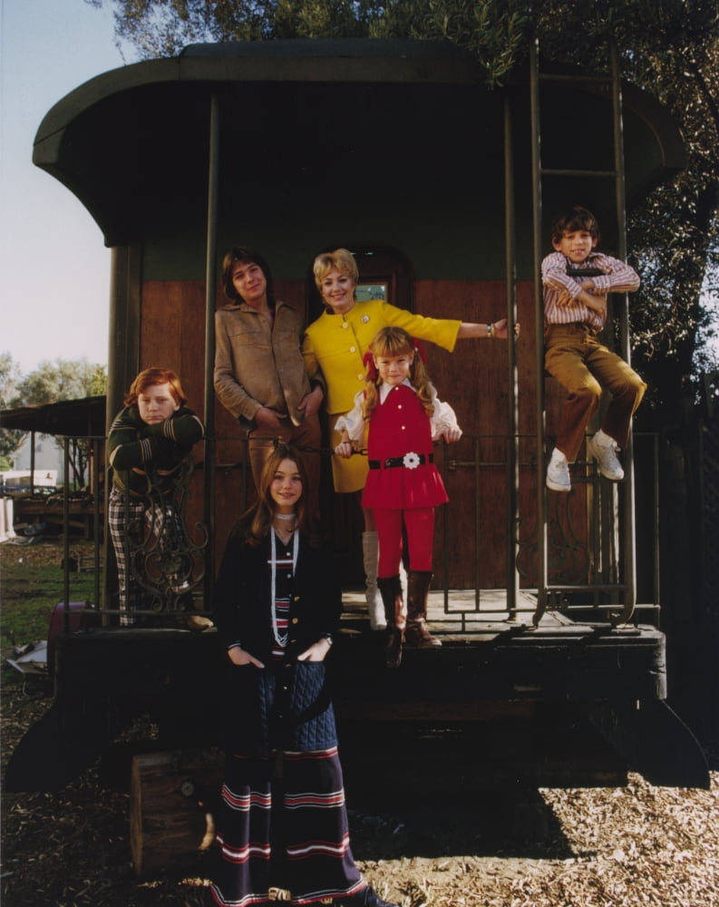 The Partridge Family group photo print in formal attire.