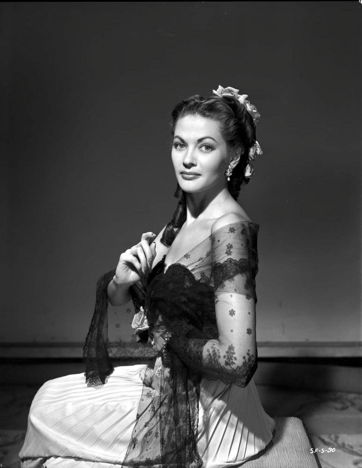 Yvonne De Carlo kneeling pose photo print in black net dress.