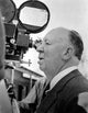 Alfred Hitchcock on Camera Photo Print, iconic film director.