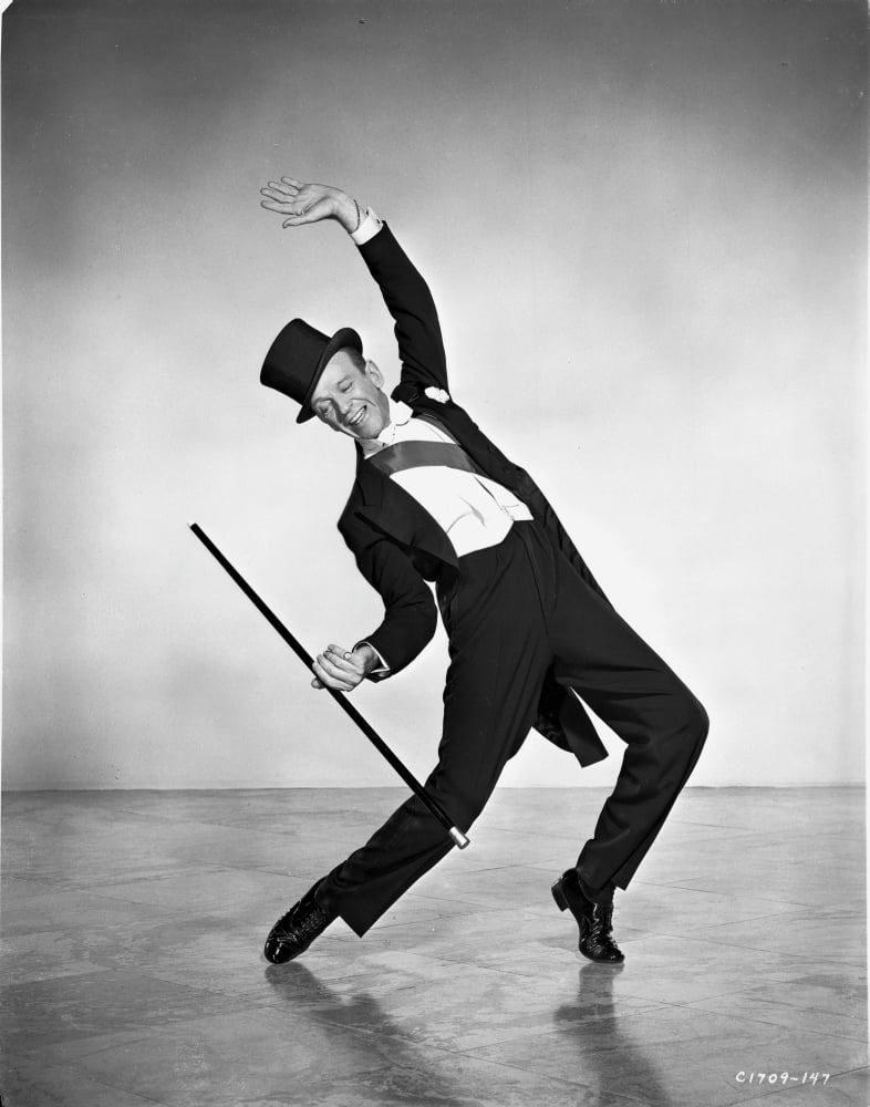 Fred Astaire dancing with a cane and top hat photo print