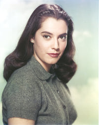 Susan Kohner wearing a gray blouse photo print