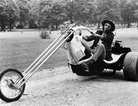 Jeff Goldblum riding a motorcycle photo print
