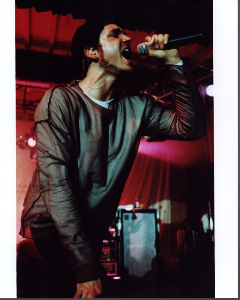 Stephan Jenkins of Third Eye Blind singing on stage photo print.