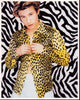 Jonathan Taylor Thomas photo print in cheetah shirt against zebra wall.