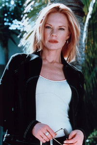 Marg Helgenberger photo print in white top and denim jacket.