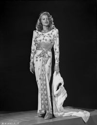 Rita Hayworth posed in a floral dress photo print