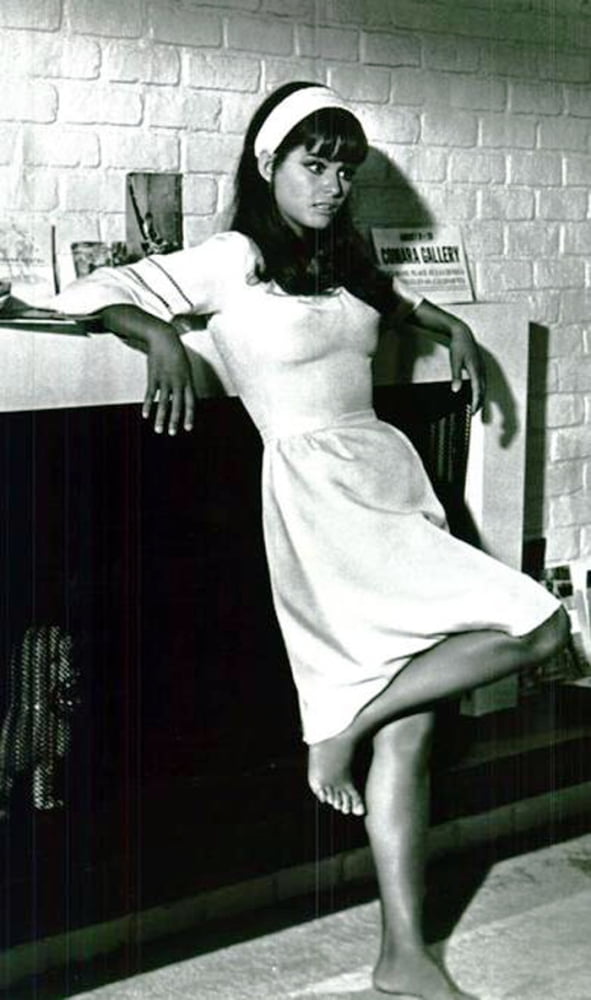 Photo print of Claudia Cardinale in a white dress, available in multiple sizes.