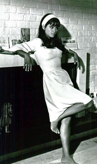 Photo print of Claudia Cardinale in a white dress, available in multiple sizes.