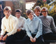 Group Picture with Peter Noone Photo Print showcasing classic music memorabilia.