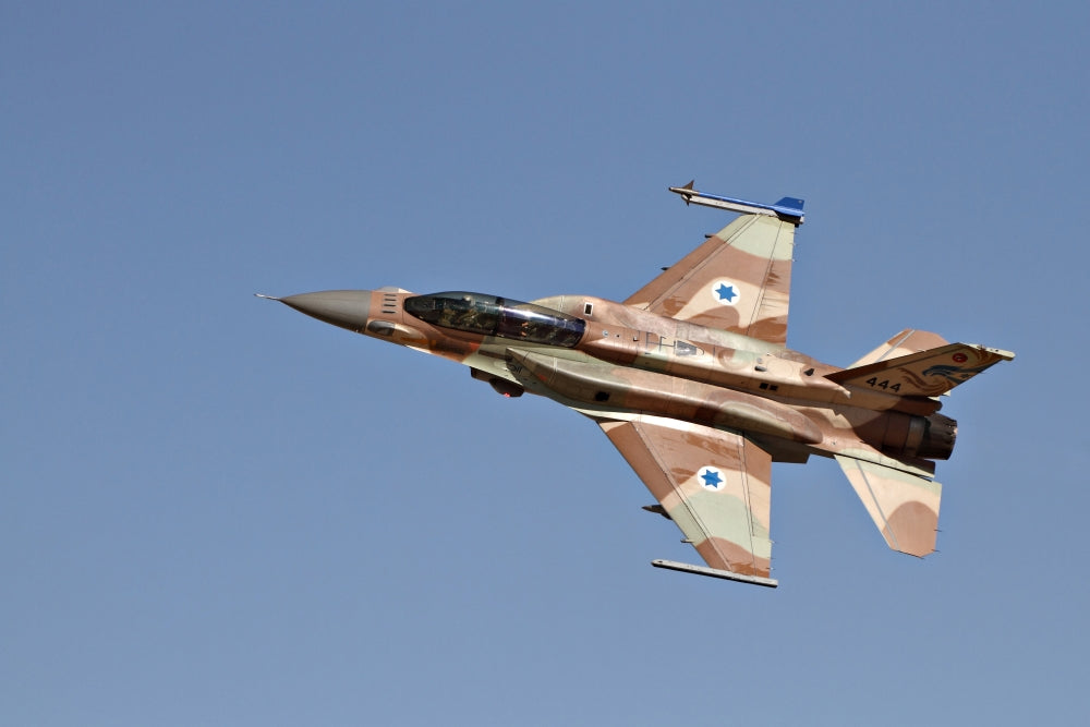 F-16I Sufa flying over Ramon Air Force Base poster print.