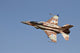 F-16I Sufa flying over Ramon Air Force Base poster print.