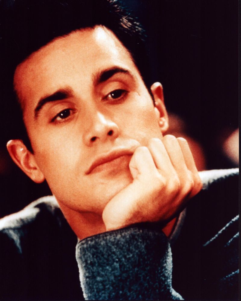 Freddie Prinze Jr. leaning on hand photo print.