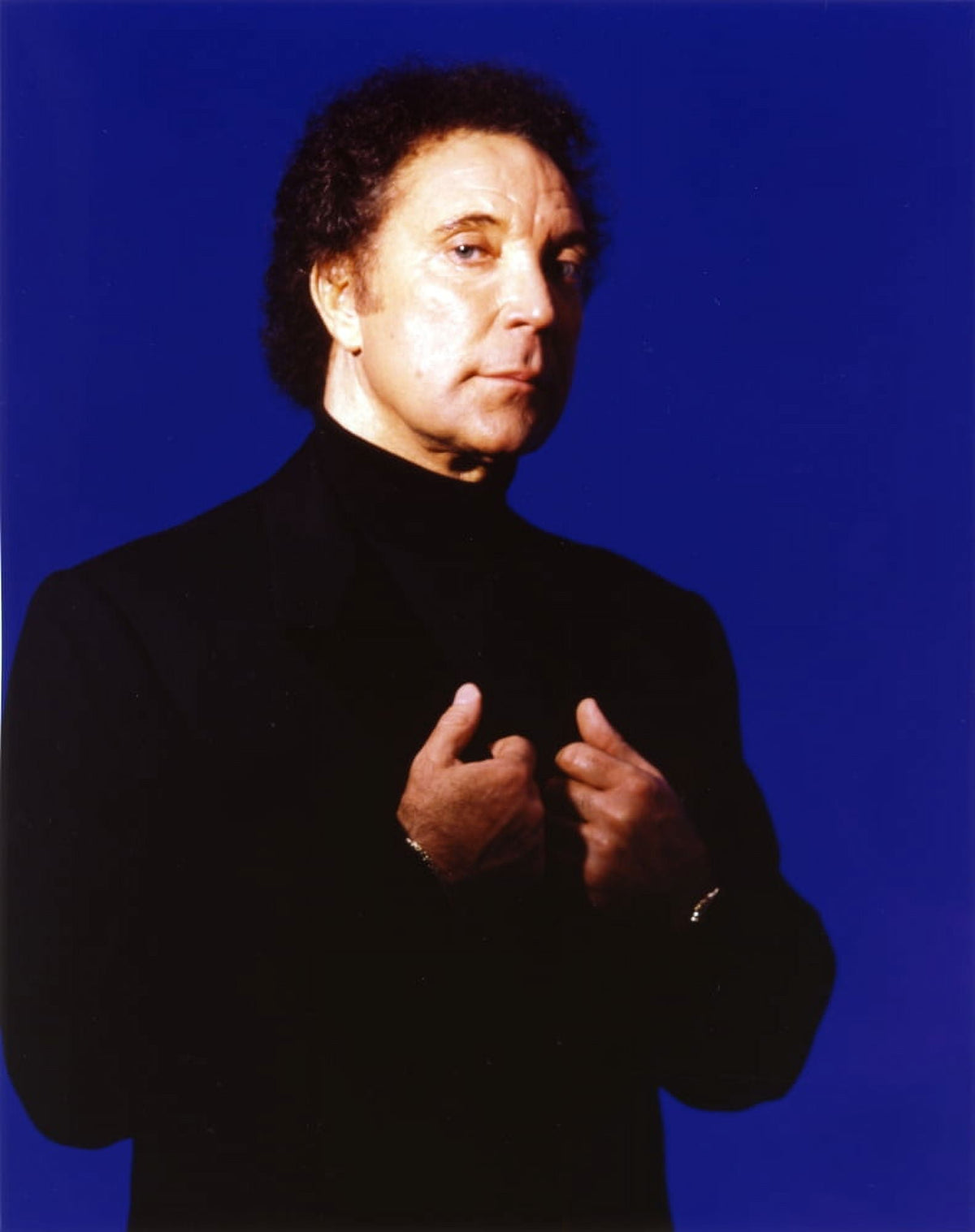Tom Jones in a classic black tuxedo photo print