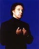 Tom Jones in a classic black tuxedo photo print