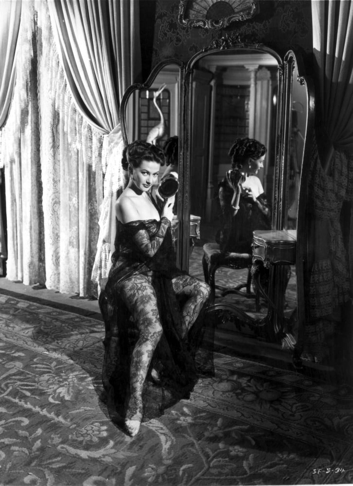 Yvonne De Carlo smiling in a classic black dress - black and white photo print.