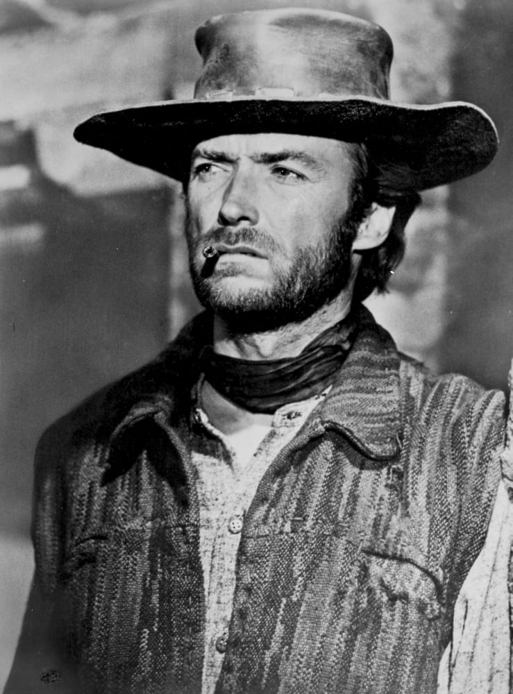 Clint Eastwood looking away in cowboy attire with cigarette photo print