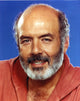 Close-up portrait photo print of Pernell Roberts with blue background.