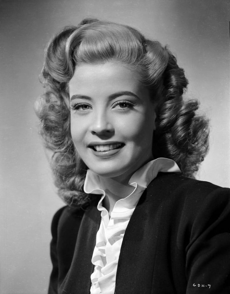 Gloria DeHaven smiling photo print wearing a black coat