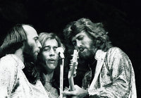 The Bee Gees live performance photo print showcasing their iconic stage presence.