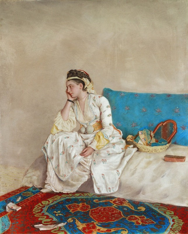 Woman in traditional Turkish dress seated on a sofa art print by Jean-Etienne Liotard.