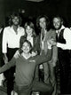Candid group photo print of The Bee Gees posing together.