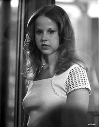 Classic portrait photo print of Linda Blair in a white dress.