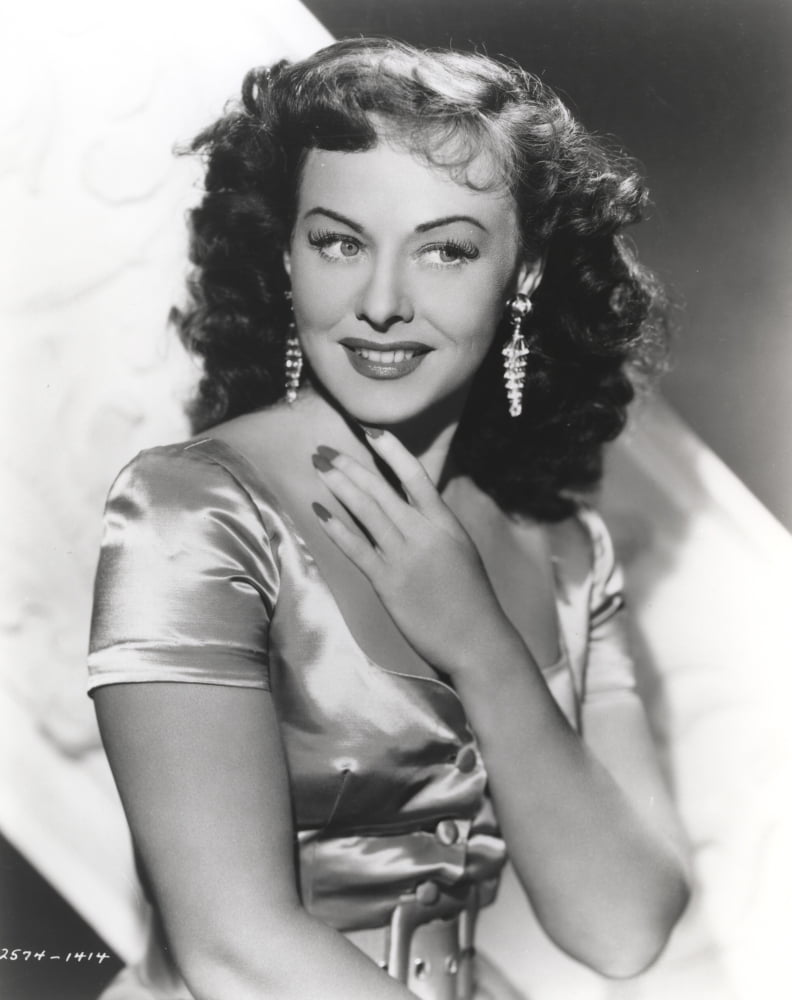 Paulette Goddard smiling in a silk blouse portrait photo print