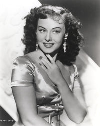 Paulette Goddard smiling in a silk blouse portrait photo print