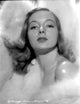 Evelyn Keyes Surrounded with Furr Photo Print - Vintage Hollywood