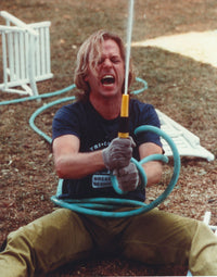 David Spade holding a water hose photo print
