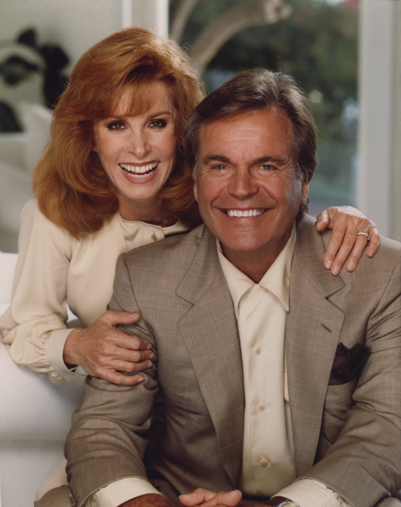 Hart To Hart photo print of a man in a suit and woman in a long sleeve dress.