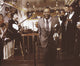 Louis Armstrong performing photo print capturing the legendary jazz musician in action.