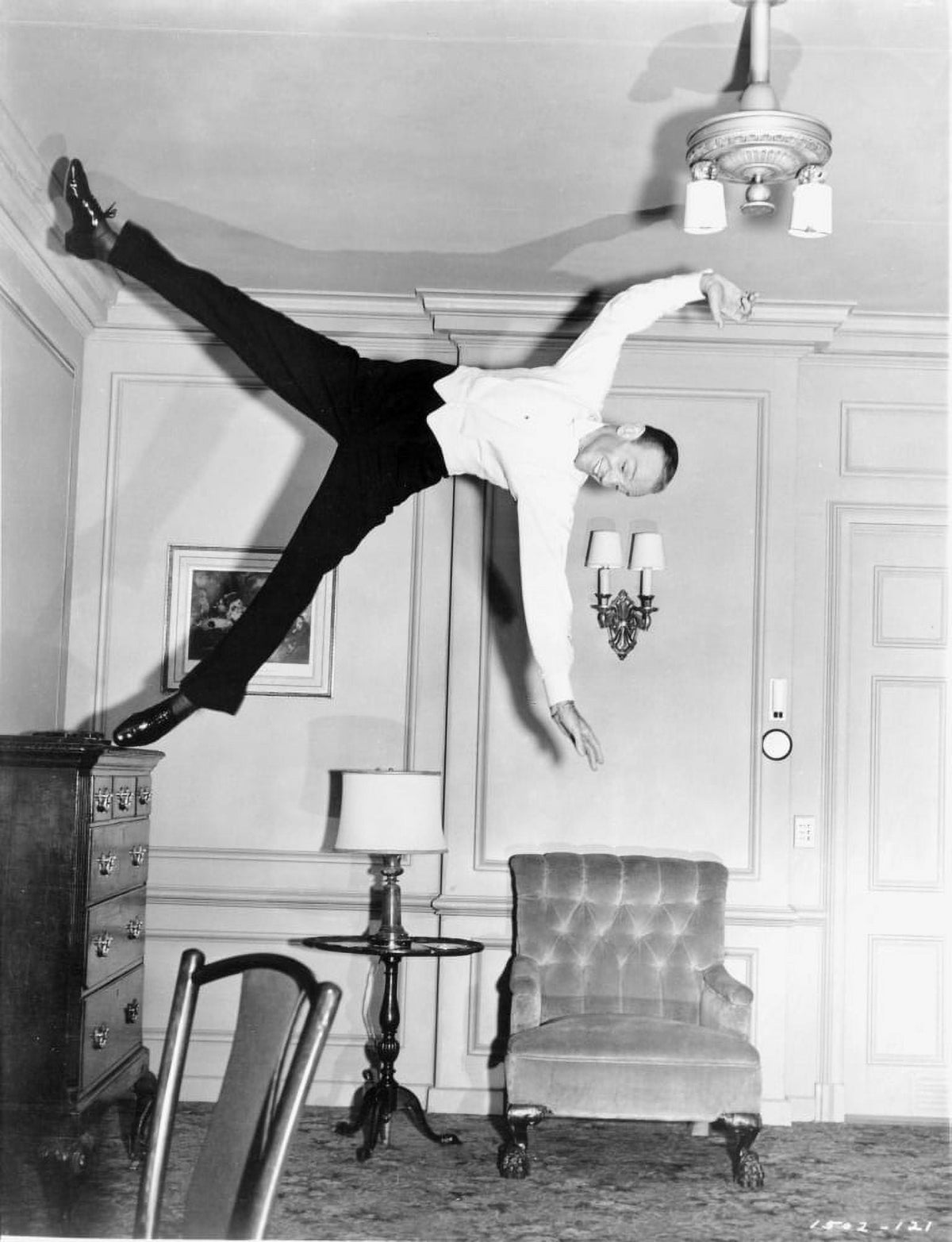 Fred Astaire falling film still photo print showcasing classic cinema