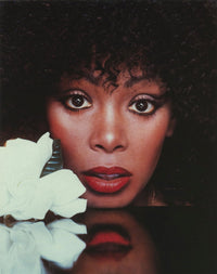 Donna Summer photo print putting her head on the table, iconic music legend.