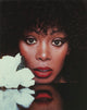 Donna Summer photo print putting her head on the table, iconic music legend.