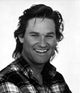 Kurt Russell smiling photo print, available in multiple sizes.