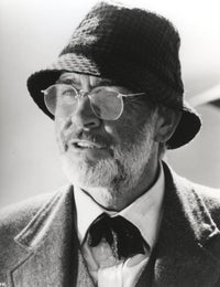 Sean Connery wearing a coat and glasses photo print.