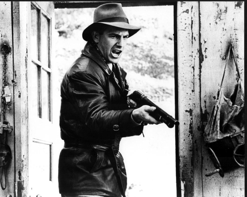 Kevin Costner yelling holding gun in The Untouchables black and white photo print