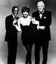 Publicity still photo print featuring Sammy Davis Jr., Liza Minnelli, and Frank Sinatra, capturing a classic Hollywood moment.