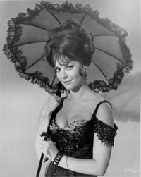 Natalie Wood holding an umbrella photo print in vintage style.
