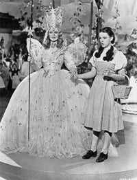 Black and white photo print of two ladies holding hands from The Wizard of Oz.