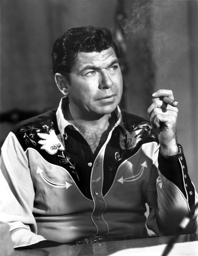 Claude Akins smoking a cigar photo print in various sizes.