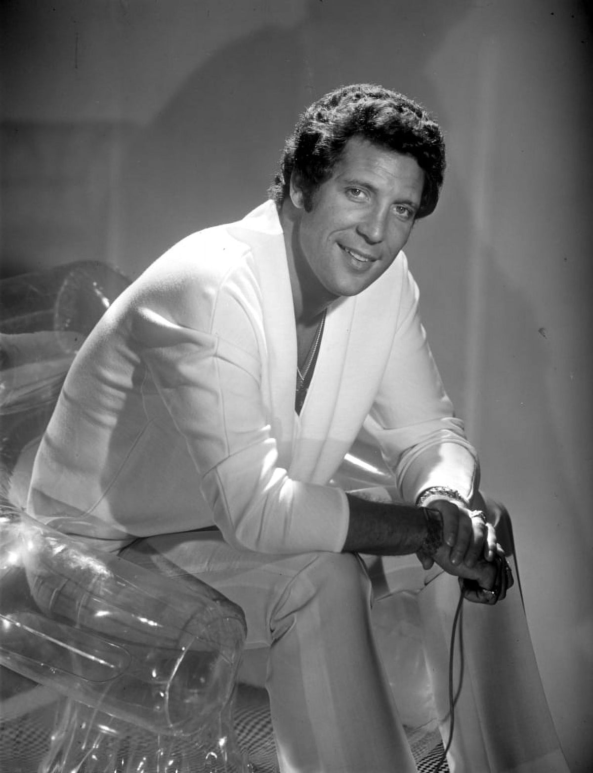 Tom Jones iconic photo print showcasing his charismatic performance.