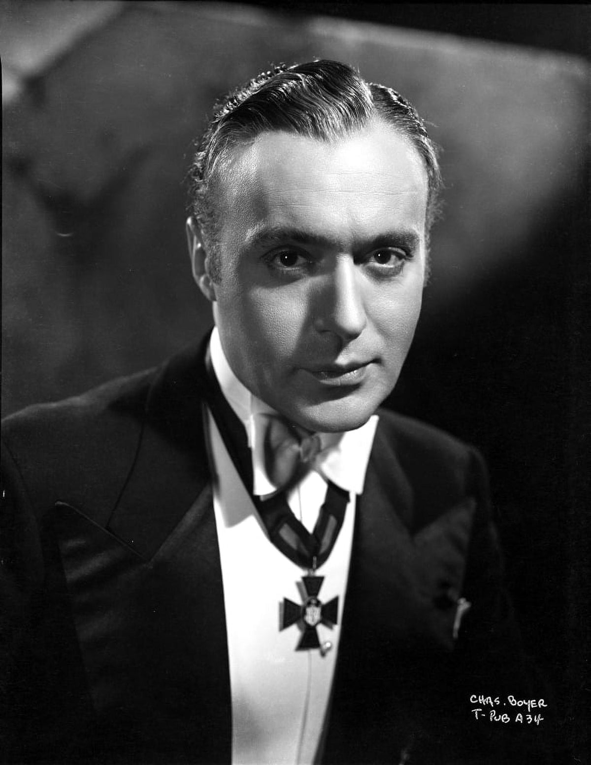 Classic Charles Boyer photo print showcasing the iconic actor.
