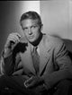 Classic portrait photo print of Robert Stack, available in multiple sizes.