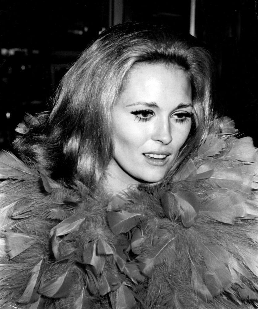 Faye Dunaway wearing feathers photo print