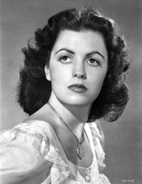 Portrait of Faith Domergue photo print showcasing classic Hollywood elegance.